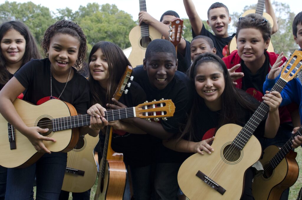 Music for Millions campaign – Happy Kids with Guitars