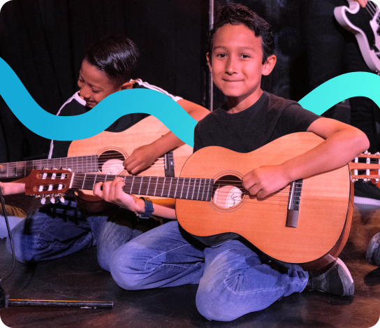 Boy playing guitar