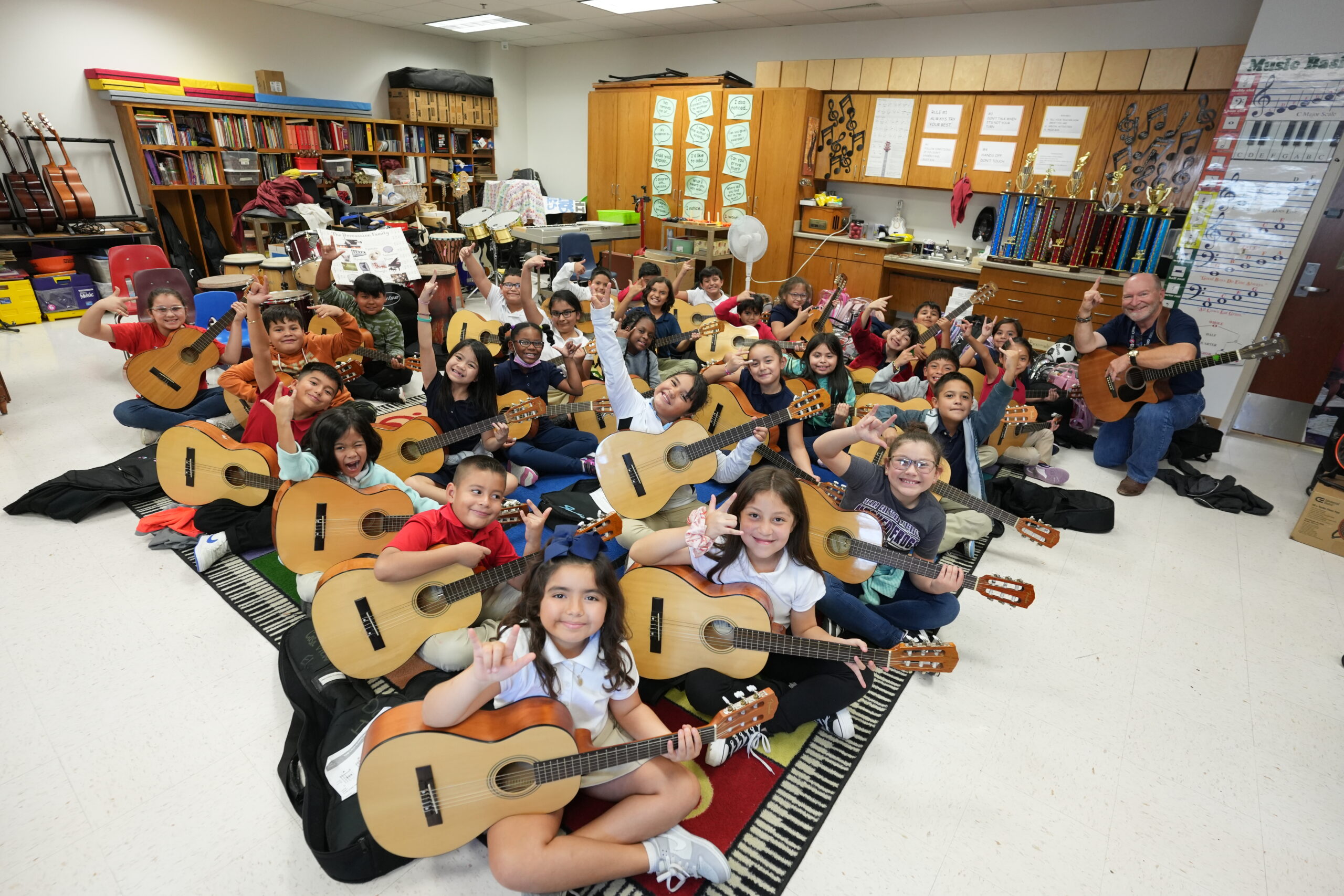 Students learning music with featured teacher Chris Drews