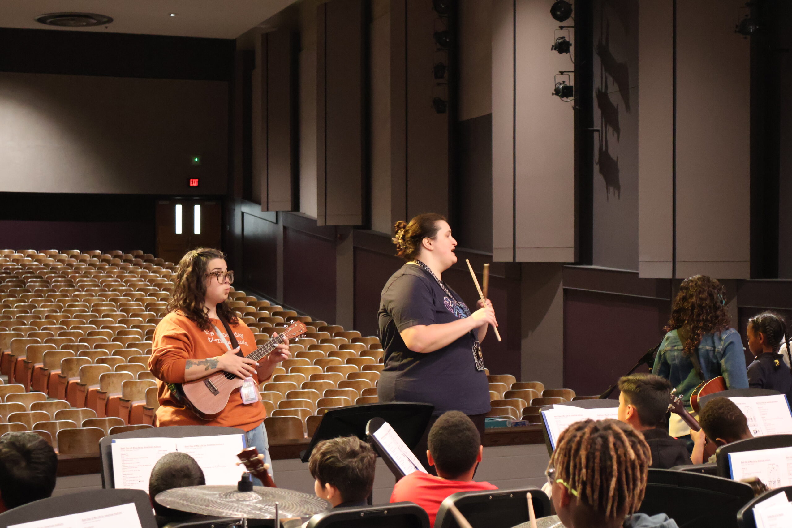 Two Music Will teachers collaborating at a JamFest