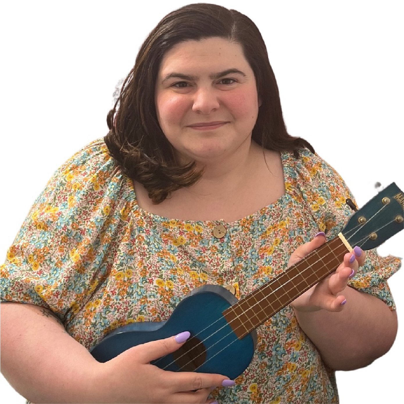 Brianne is wearing a patterned blouse and holding a ukulele as though she is playing it.